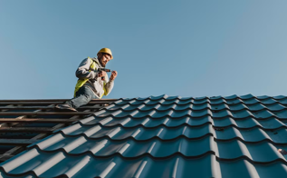 long-shot-man-working-roof_23-2148748777.png